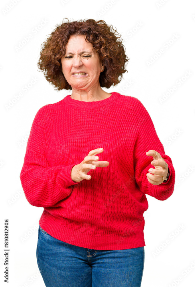 Sticker beautiful middle ager senior woman red winter sweater over isolated background disgusted expression,