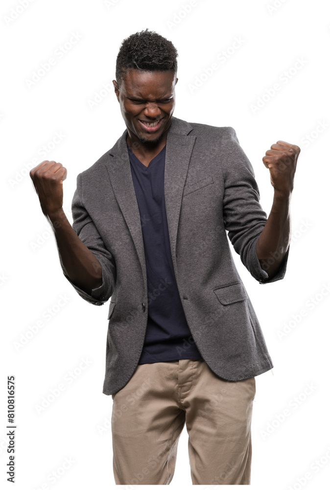 Wall mural Young african american man wearing a jacket screaming proud and celebrating victory and success very excited, cheering emotion