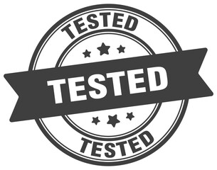 tested stamp. tested label on transparent background. round sign