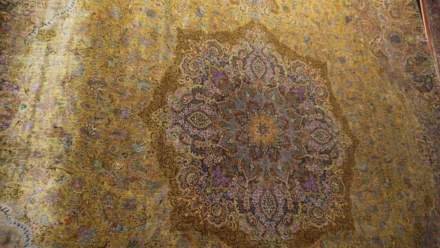 The wide range of the hand made carpets, traditional knotted Uzbek silk rugs in the bazaar, Bukhara, Uzbekistan, Central Asia