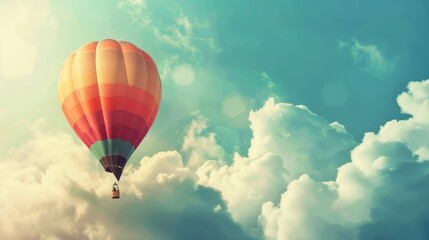 Fototapeta premium A hot air balloon is floating in the sky above a blue and white background
