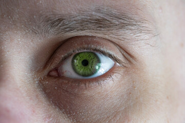 close up part male face, young man 25-30 years old, human eye looking directly, concept...