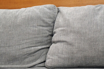 Closeup Couple light gray pillow surface on the sofa - 2 piece   
