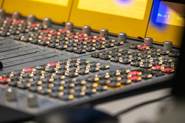 Detailed view of professional audio mixing console in recording studio