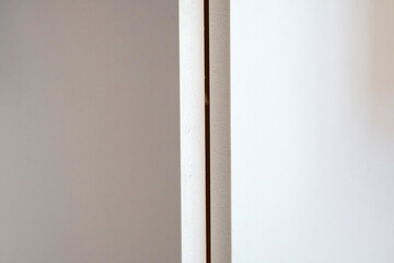 detail of a wooden door - White color Corner of Wooden