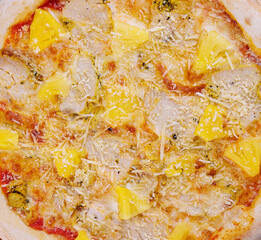 Tasty hawaiian pizza with chicken and pineapple