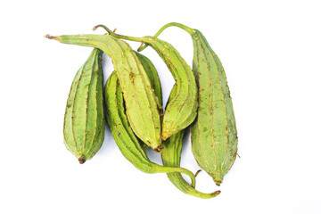 Ripe green Chinese okra fruits isolated on white, Vegetable ridge gourd or Luffa Acutangula...