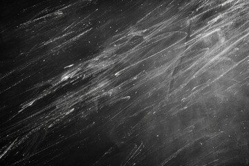 Fototapeta premium A close-up shot of snow flakes in black and white. Suitable for winter-themed designs