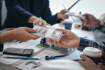 Fototapeta premium Skilled team of engineers collaborates in meetings, drafting blueprints for condos, apartments, houses. Negotiating costs, bids, and contracts, they ensure efficient cooperation on construction sites.