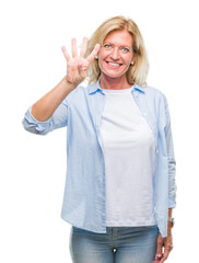 Middle age blonde woman over isolated background showing and pointing up with fingers number four while smiling confident and happy.