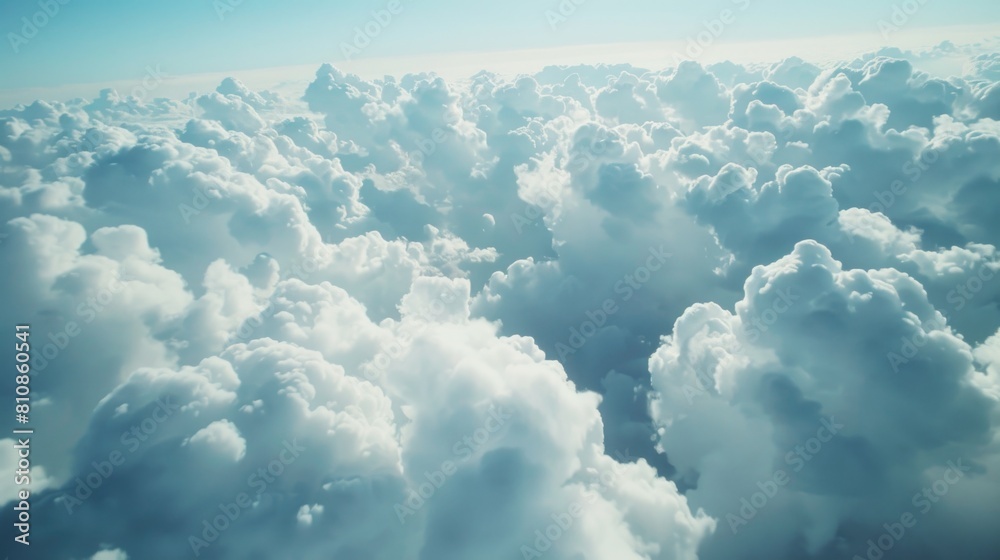 Poster a view of the clouds from an airplane, perfect for travel and nature concepts