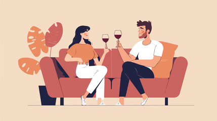 Cute couple sitting on sofa and drinking wine during