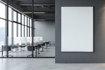 A mockup of an empty white poster on the wall in front, placed inside a modern office room with glass walls and desks, in the professional photography style