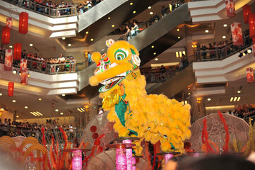 vibrant lion dance performance in mall captivating spectators