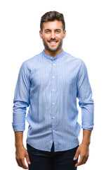 Young handsome man over isolated background with a happy and cool smile on face. Lucky person.