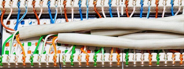 rear view of a patch panel with wires closeup