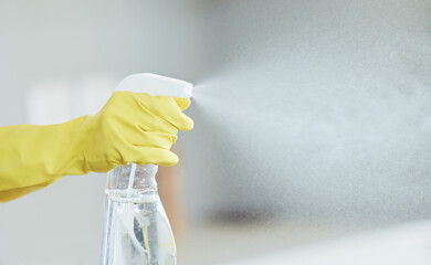 Spray, bottle and hands with product for cleaning, chemical disinfection or janitor working...