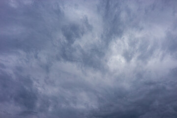 background in the form of a cloudy gray sky.