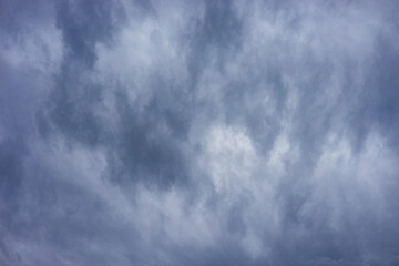background in the form of a cloudy gray sky.