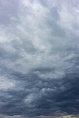 vertical background in the form of a cloudy gray sky