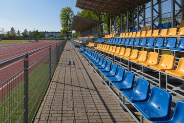SPORTS FACILITIES - Grandstands for spectators at an athletics stadium

