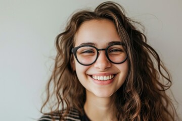 Obraz premium Attractive woman with glasses smiles for the camera Fictional Character Created By Generative AI. 