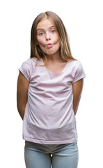 Fototapeta premium Young beautiful girl over isolated background making fish face with lips, crazy and comical gesture. Funny expression.