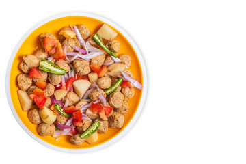 Plate of salad with meal maker and vegetables isolated on white background. Top view