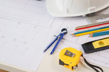 A home architect is reviewing a draft house plan. Projects assigned by customers and customized design before delivery Interior design and decoration ideas, African American, Indian