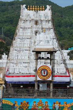 Vertical close-up photo of the main gopuram of the Balaji temple. Tirumala, Tirupati, India, March 3, 2024