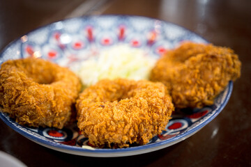 Crispy deep fried shrimp cake, is one of well known Thai style appetizers eaten with plum sauce.