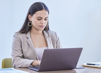 Laptop, typing and business woman reading email for project, research or communication online in...