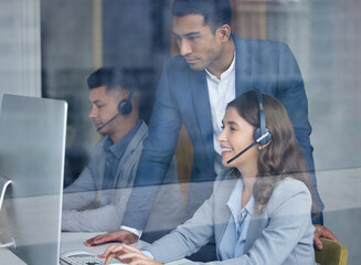 Call center, supervisor and training with telemarketing people in office for customer service or support. Computer, contact us and window with agent team in workplace for communication or solution