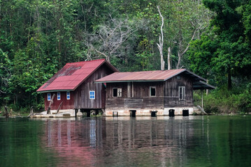 Obraz premium Submerged Mysteries: The Sunken Temple of Nam Ou in Laos