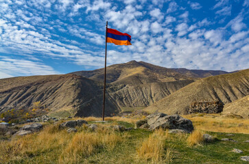 Armenian flag on the ruins of Bjni fortress (Kotayk province, Armenia)