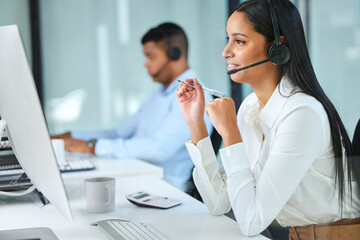 Computer, callcenter and woman with discussion, headset and sales consultant in customer service conversation. Lead generation, telemarketing and virtual assistant with phone call at help desk office