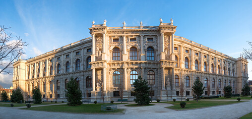 back side of the art history museum in vienna, historical building with conifer garden