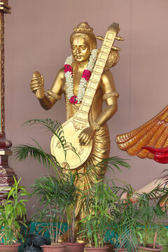 Golden figure of Hindu saint Narada Muni. Tirumala, Tirupati, March 2, 2024