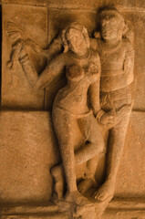Stone carved divine couple. temples and shrines at Pattadakal temple complex, 7th century,...
