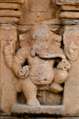 Stone carved divine Ganesha. temples and shrines at Pattadakal temple complex, 7th century, Karnataka, India. UNESCO World Heritage Site.
