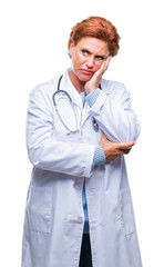 Senior caucasian doctor woman wearing medical uniform over isolated background thinking looking tired and bored with depression problems with crossed arms.