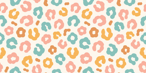 Simple pastel leopard or cheetah skin print seamless pattern. Hand drawn gender neutral pastel leopard print background. © Olga