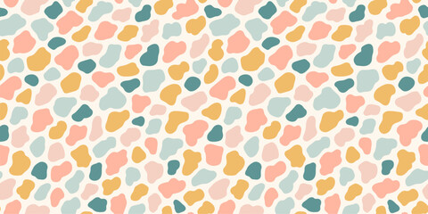 Abstract pastel cow, giraffe spots seamless pattern. Animal skin organic blob shapes background. Hand drawn safari print