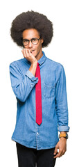 Young african american business man with afro hair wearing glasses and red tie looking stressed and nervous with hands on mouth biting nails. Anxiety problem.