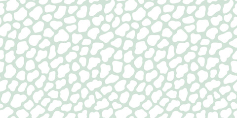 Abstract pastel sage green cow or giraffe spots seamless pattern. White organic blob shapes on a mint green background. © Olga
