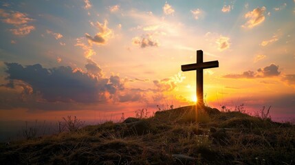 The powerful silhouette of a cross at sunset, standing atop a hill as a beacon of hope and a symbol of sacrifice and redemption in Christian faith