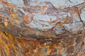 Rusty texture on the old mooring bollard, heavy corrosion of steel