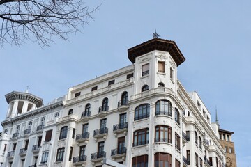 Corner of classical buildings with elegant lines downtown in Zaragoza, Aragon, Spain. Vintage...