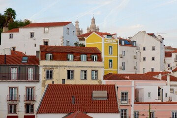 Weathered residential buildings on the hills of Aflama district, Lisbon, Portugal. Vintage architecture
