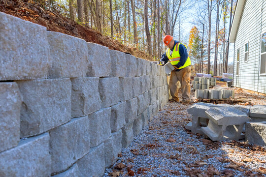 Concrete block retaining wall was mounted by contractor